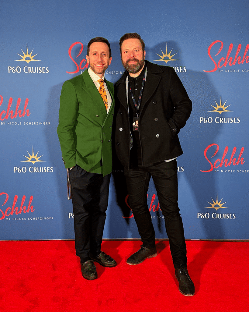 Adrian poses with colaborrator on the red carpet of Schh!
