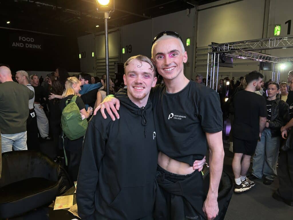 Tate and Ethan pose together on the Performers Stand at Move It