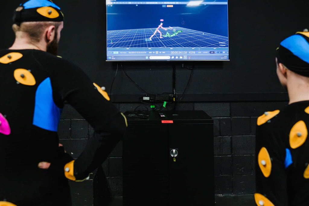 two students review their generated sequence on screen