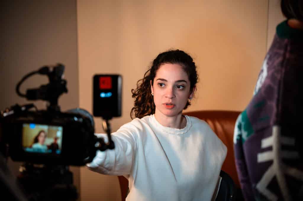 Performers College Essex student in front of a camera